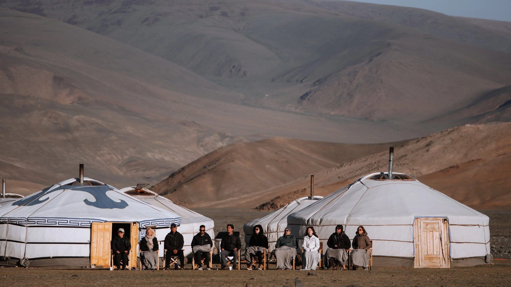 A circle of yurts in the Mongolian hills