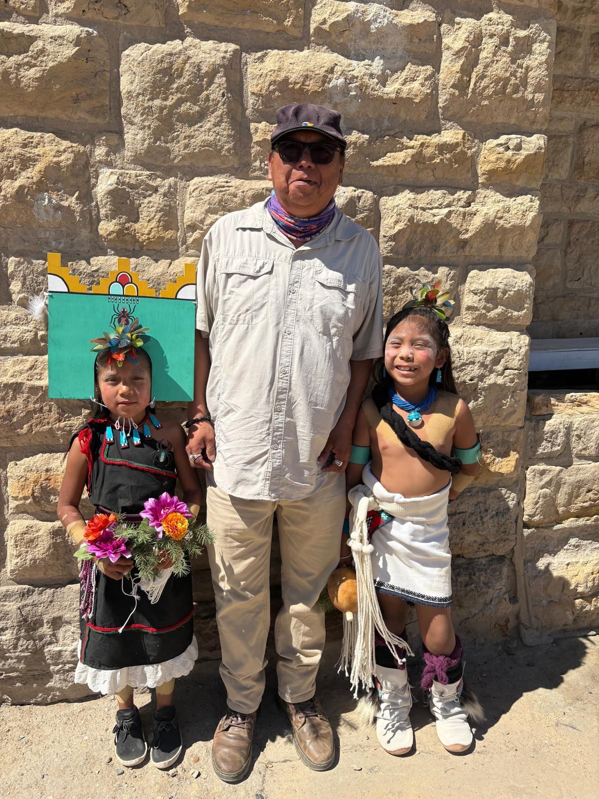 A Hopi elder with children