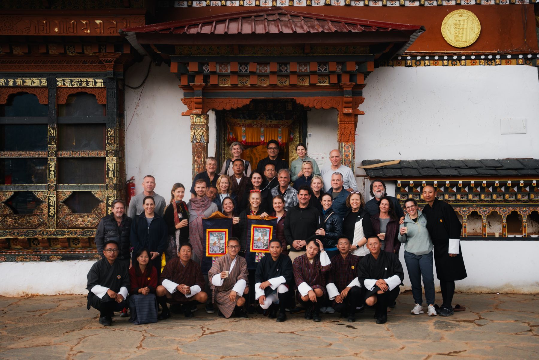 An Abroad group gathered together at a dzong in Bhutan