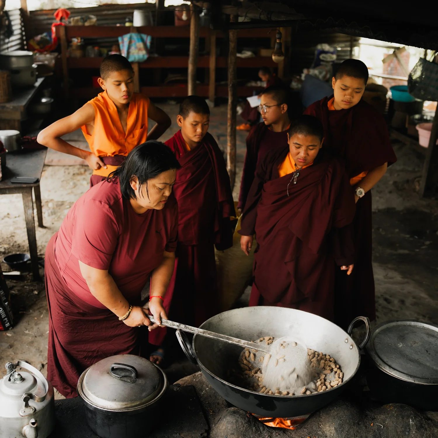 Her Eminence in the kitchen with travellers